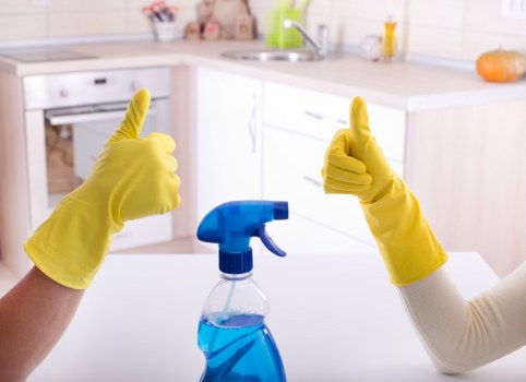 Professional carpet cleaning in an Islington home with a deep-cleaning machine